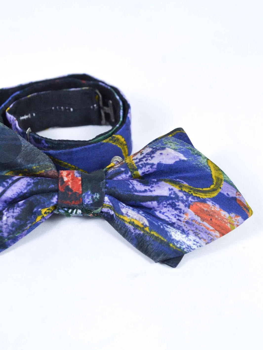 1970s bow tie with surrealist-inspired print